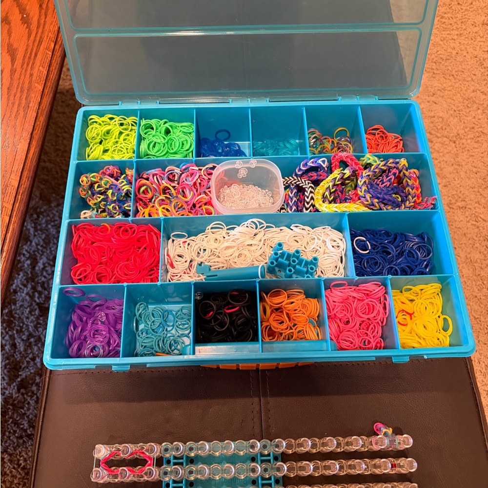 Rainbow Loom Kit with many colored bands.